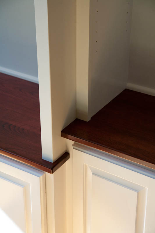 This image shows the detail work in a custom made built-in cabinet.