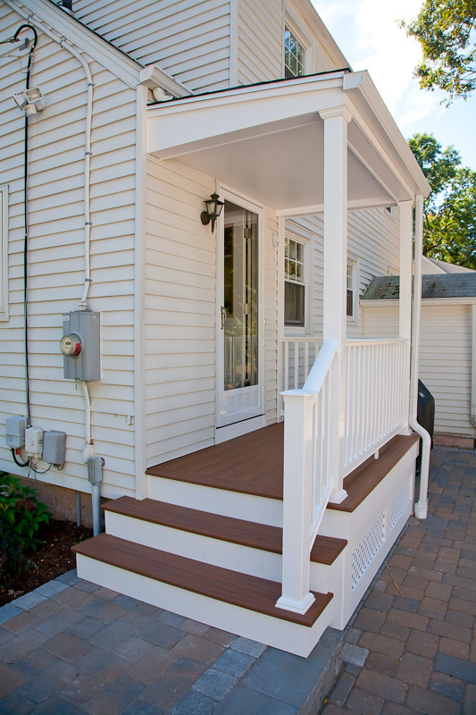 A porch renovation with composite decking and railings in Glastonbury CT