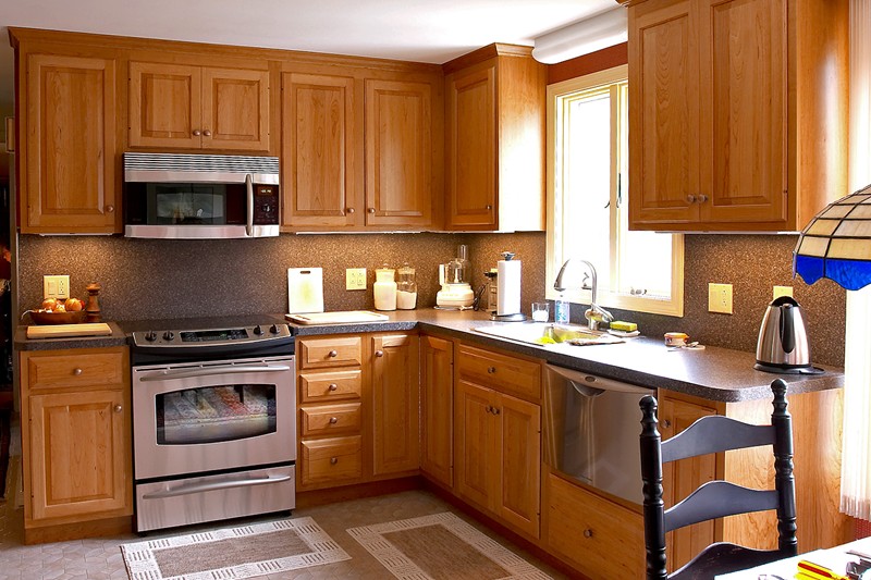 Kitchen remodeling job with custom built cherry cabinets in Glastonbury, CT