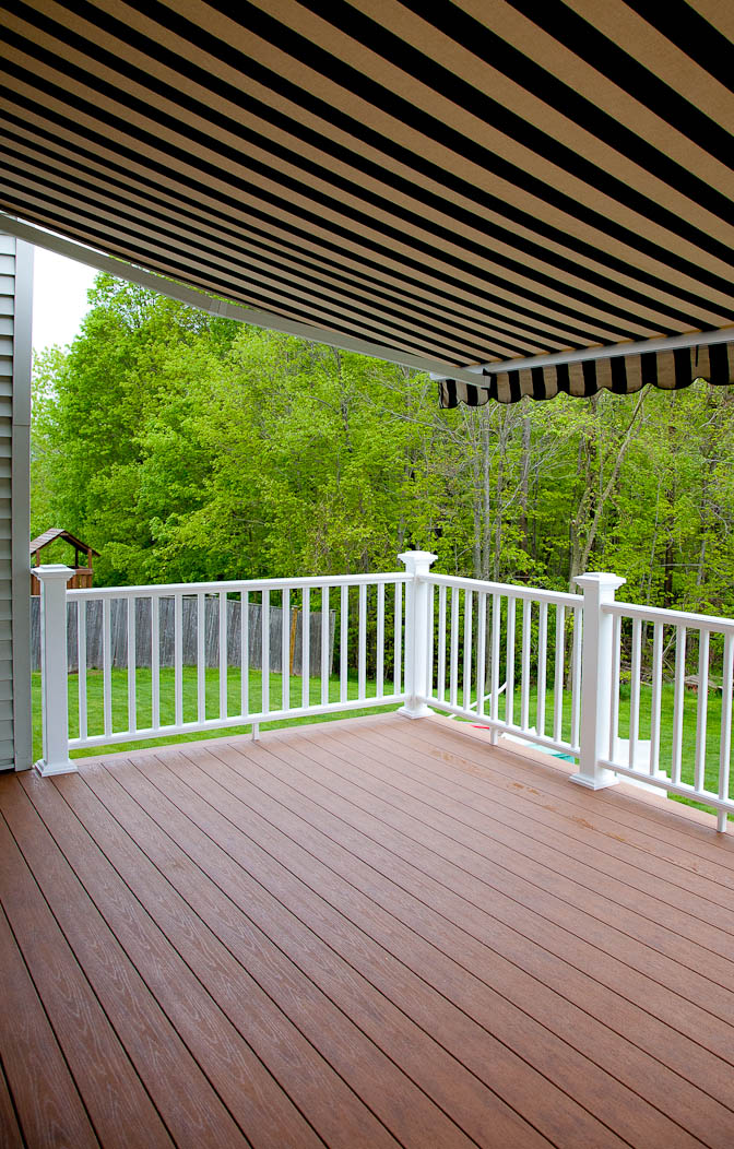 An awning covers a composite deck in Rocky Hill, CT.