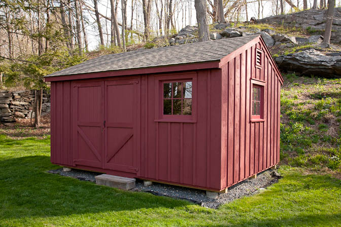A custom built rough sawn pine shed by a glastonbury shed builder.