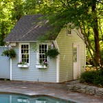 A light gray pool house in Farmington, CT
